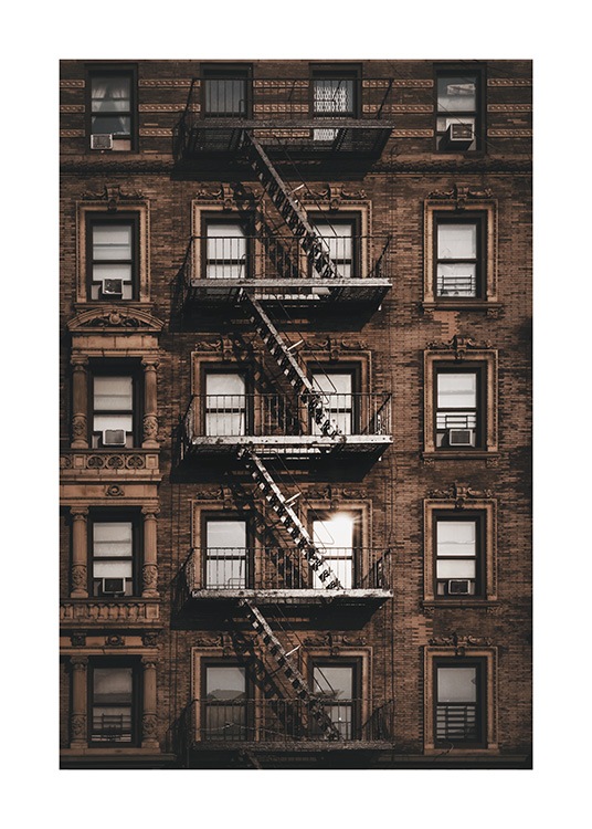  – Foto van een gebouw in New York met ramen en een brandtrap