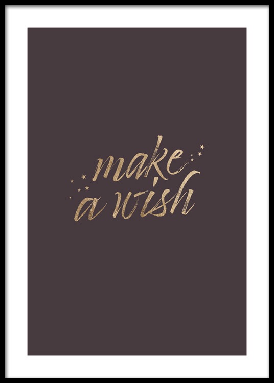  – Text „Make a wish“ in Gold auf einem braunen Hintergrund