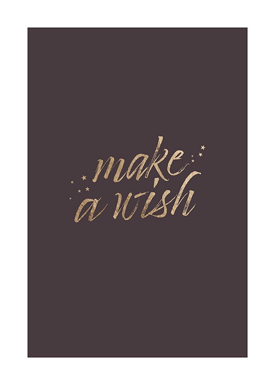  – Texte « Make a wish » écrit en doré sur un fond marron