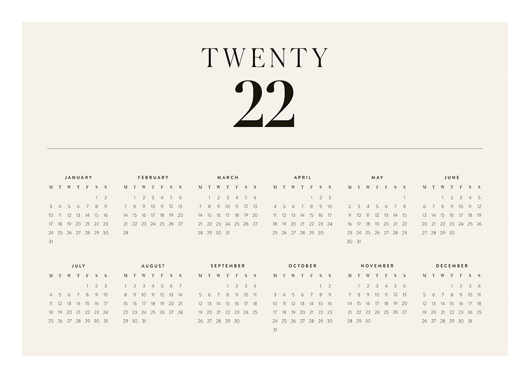  – Calendrier annuel de 2022 en beige avec tous les mois et dates indiqués en noir